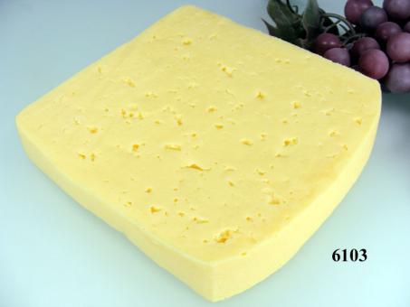 a piece of cheese Tilsiter 
