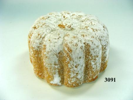 ring-shaped cake with powdered sugar, small 