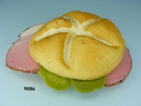 sliced ham on a roll 