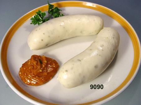 a couple of white sausages with mustard 
