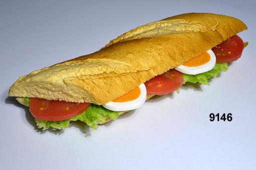small baguette  with tomato/egg 